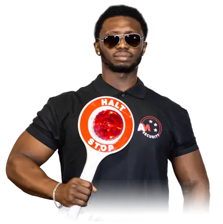 Sicherheitsmitarbeiter mit Halte-Stopp-Schild für die Einlasskontrolle bei Oberbayern Düsseldorf.